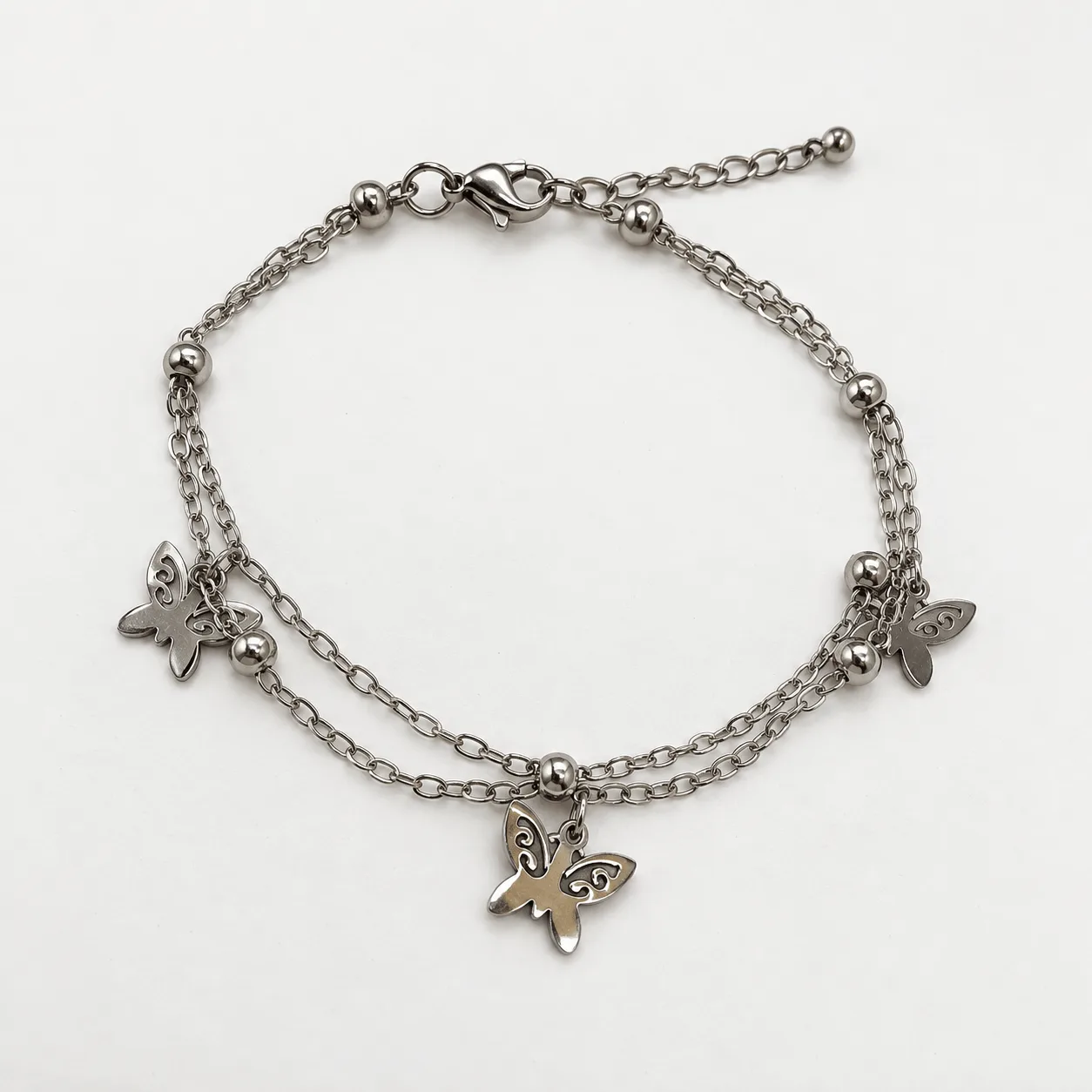 pulsera plateada doble mariposas