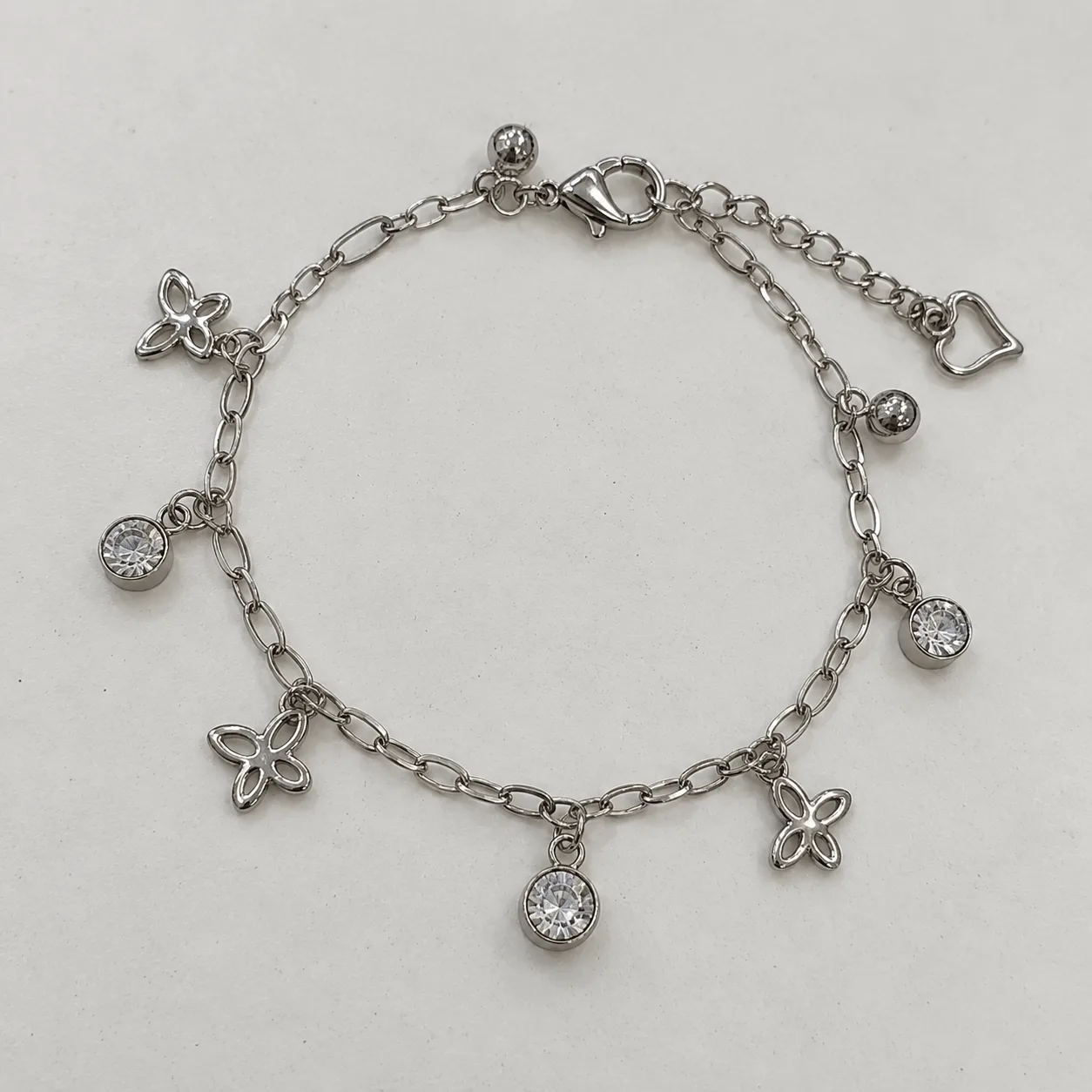 pulsera acero plateada mariposa chica y circones
